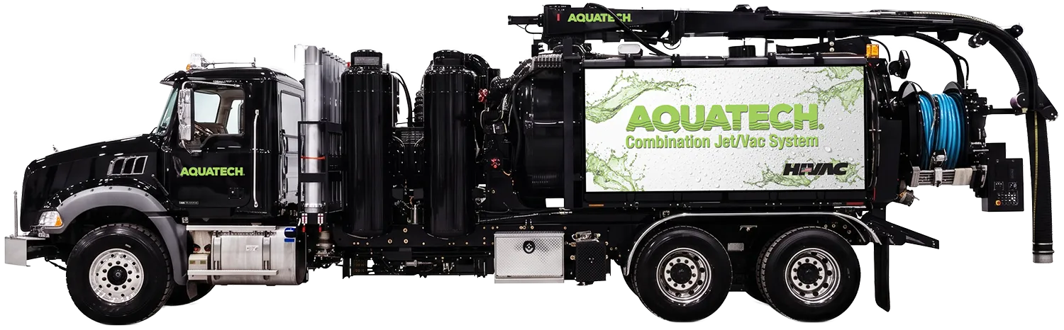 Aquatech combination sewer jetter truck with Jet/Vac System branding and mounted reel for sewer cleaning applications.