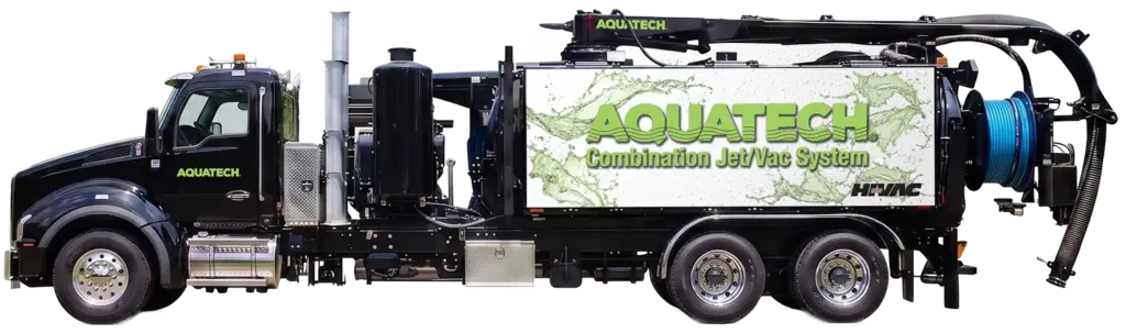 Aquatech combination sewer jetter truck with mounted equipment and Jet/Vac System branding in operation-ready state.