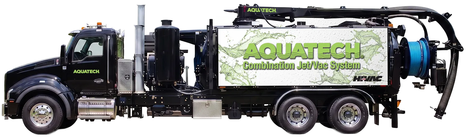 Aquatech combination sewer jetter truck with mounted equipment and Jet/Vac System branding in operation-ready state.